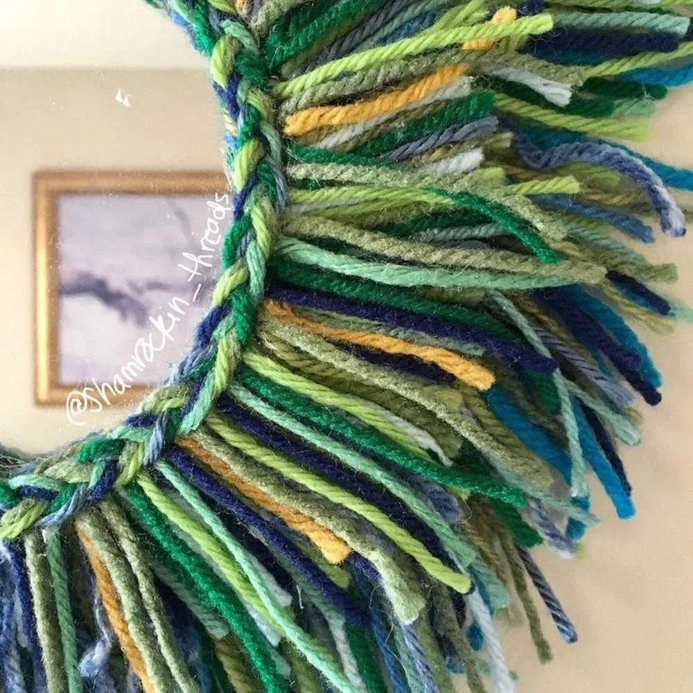 blue green and gold fringe mirror